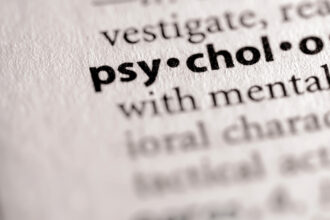 A diverse group of students engaged in an online discussion about psychology. Online Psychology Bachelor's Degree