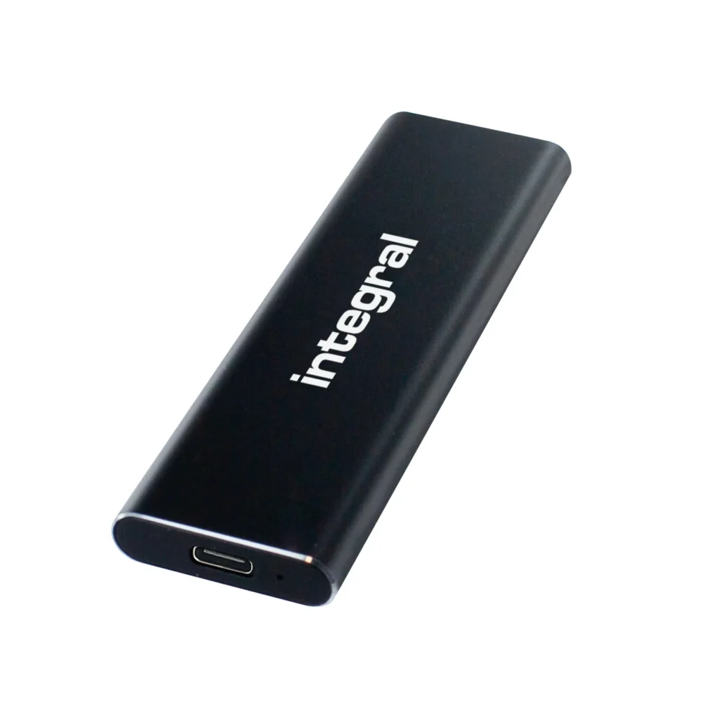 A close-up of a USB 3.0 cable being plugged into a port on a portable external SSD.